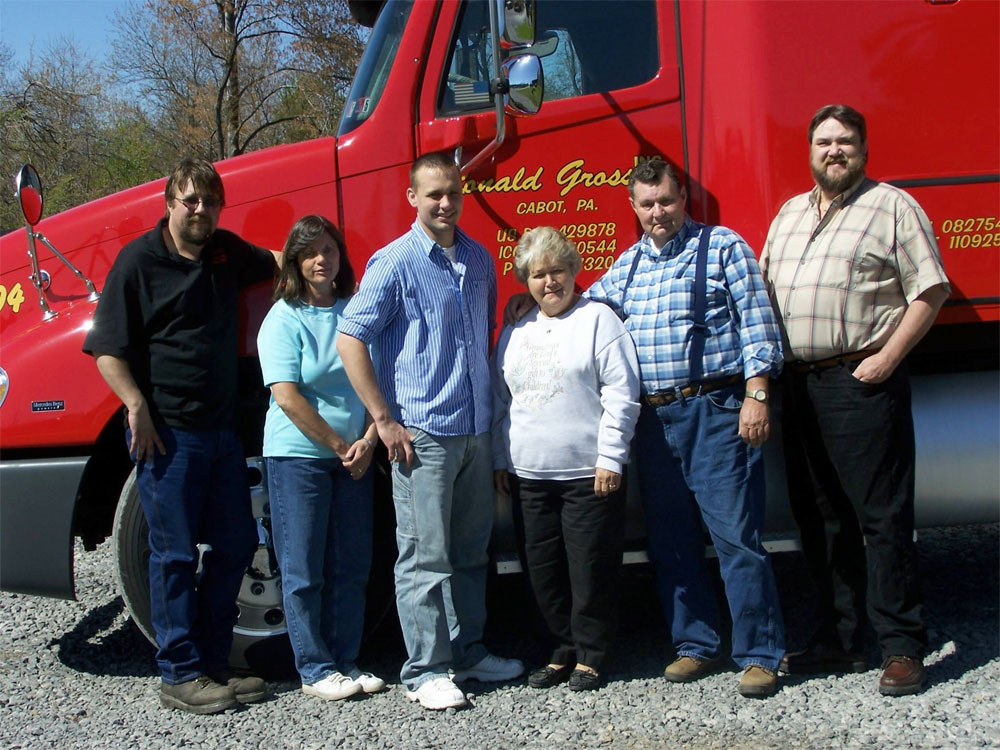 A family photo of the ownership of Ronald Gross Inc.